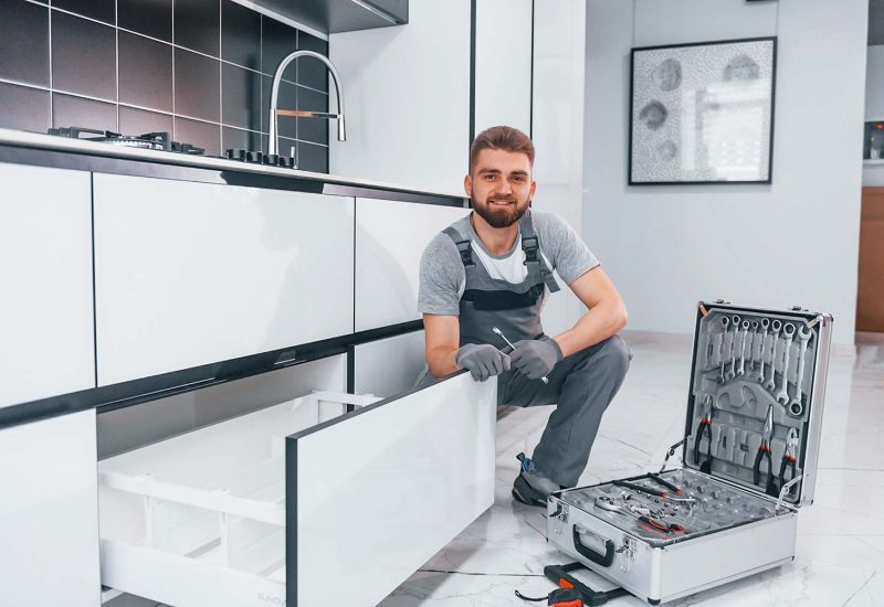young-professional-plumber-in-grey-uniform-using-e-resize.jpg young-professional-plumber-in-grey-uniform-using-e-resize.jpg